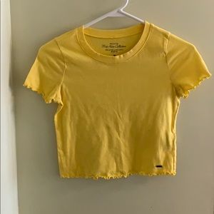 Bright yellow lettuce edge crop top
